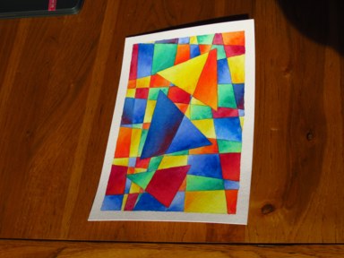 A painting of 3 brightly-coloured triangles, intersected by a single diagonal line, against an irregular grid of bright facets.